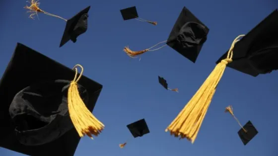 graduation hats in air