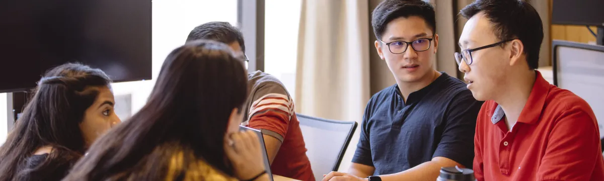 A group of students sitting at a table